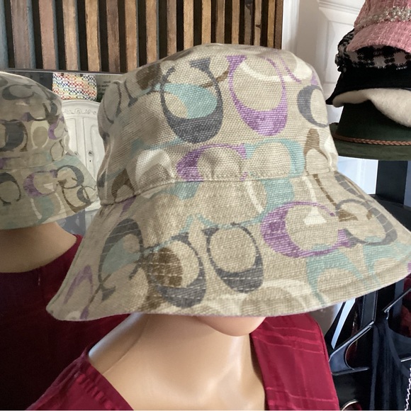 Coach canvas bucket hat in tan with multicolor monogram design. - Picture 1 of 6